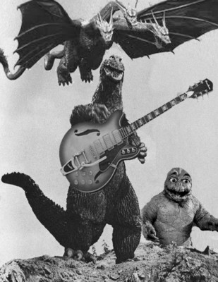 Godzilla with Guitar Baby Godzilla Monsters of Rock t-shirt100% cotton-image
