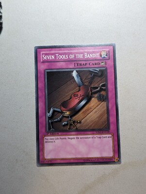 Yu-Gi-Oh Card - Seven Tools of the Bandit 5DS1 EN039 1st Ed-image