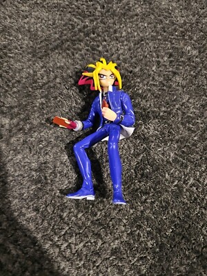 VTG 1996 YU-GI-OH YAMI YUGI MOTO Puzzle Necklace & Card Dealing Figure-image