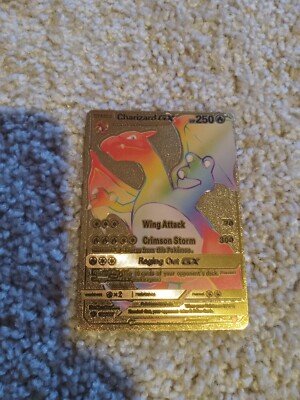 Rainbow charzard gold background normal size great condition barely used verynew-image
